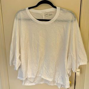 NWT. Aerie medium white top. Asymmetrical sleeves.